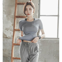 Load image into Gallery viewer, Bộ đồ thể thao nữ 2 mảnh siêu đẹp tập gym yoga hàng nhập khẩu hót hit 2018